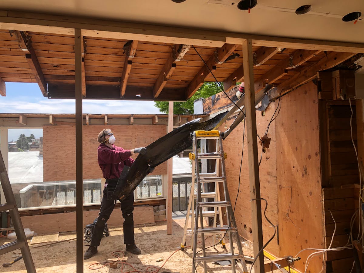 High Quality Renovations tradesman at work on a Halifax home